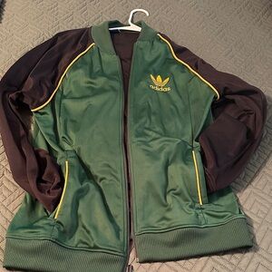 Adidas Green and Black Jacket with Yellow Trim 2-piece sweatsuit.